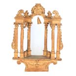 AN 18TH CENTURY ITALIAN CARVED GILT WOOD ALTARPIECE or rococo design with a shell crest supported on
