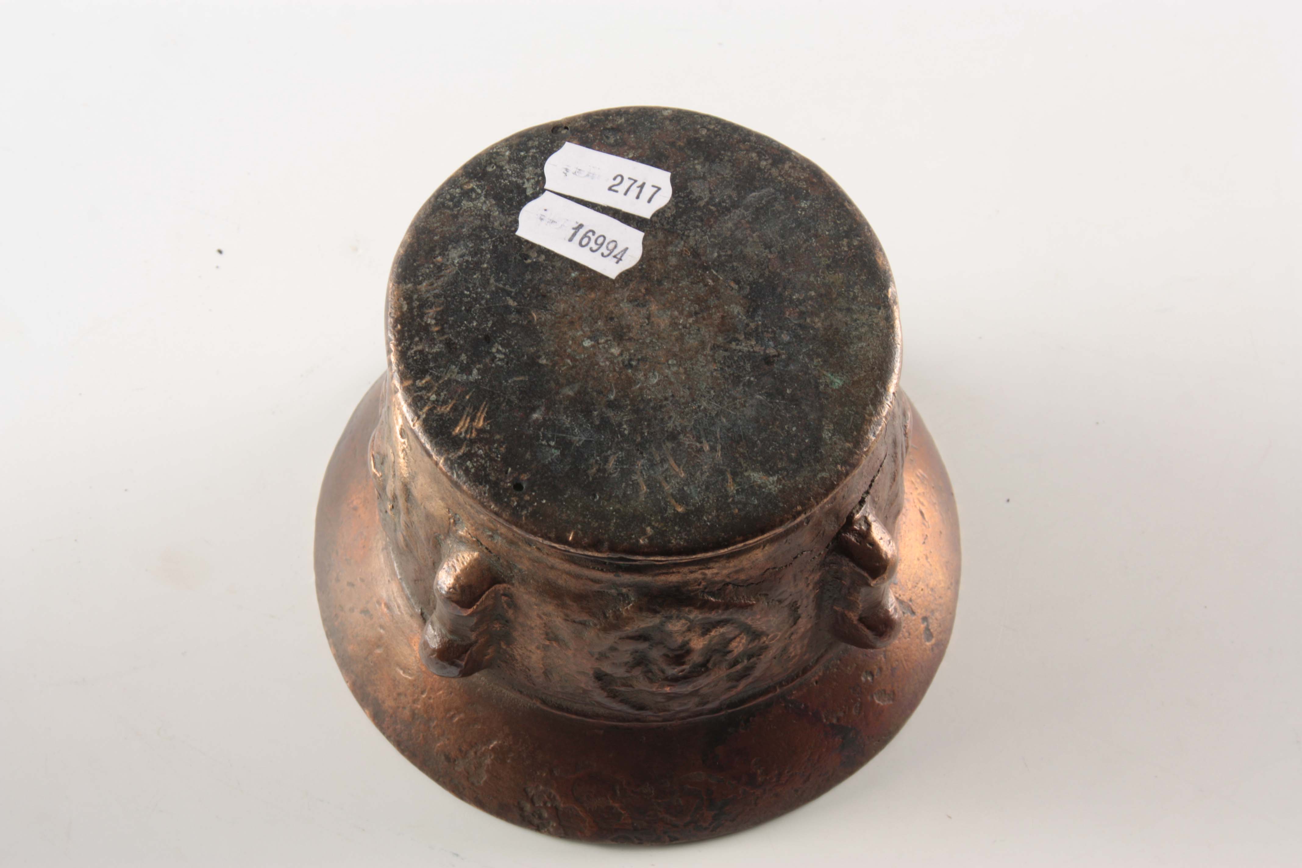 A 17TH CENTURY BRONZE MORTAR with shaped side handles and cast medallions 10cm high 14cm diameter. - Image 4 of 4