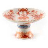 A 19TH CENTURY CHINESE IRON RED GLAZED TAZZA decorated around the dished top with peaches and