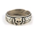 A 20TH CENTURY NAZI SS THUMB RING with deaths head inscribed to the inside 27mm diameter.