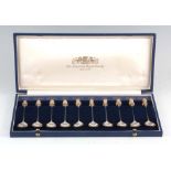 AN ELIZABETH II CASED SET OF TWELVE ROYAL SPOONS with busts to the ends of the Royal family from