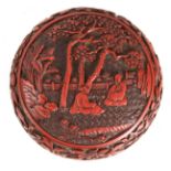 A LATE 19TH CENTURY CHINESE CINNABAR LACQUER CARVED LIDDED BOWL with figures beneath blossoming