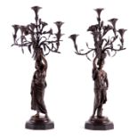 AFTER CHARLES CUMBERWORTH. A PAIR OF 19TH CENTURY FIGURAL BRONZE CANDELABRA with naturalistic six