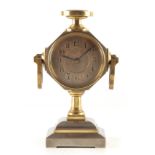 A LATE 19TH CENTURY FRENCH INDUSTRIAL MANTEL CLOCK the brass and silvered case surmounted by a