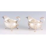 A PAIR OF LATE 20TH CENTURY SAUCE BOATS each with three hooved legs and scroll handles, by Roberts &