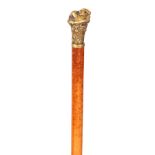 A 20TH CENTURY FRENCH ART NOUVEAU MALACCA CANED WALKING STICK with brass leaf cast pommel with two