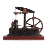 A STUART SINGLE-CYLINDER BEAM ENGINE on green painted cast base mounted on a wooden plinth, the beam