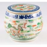 A 18TH/19TH CENTURY FAMILLE VERTE CHINESE BOWL AND COVER decorated with animals and dragons,