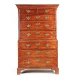 A GEORGE III MAHOGANY CHEST ON CHEST with moulded dentil cornice above two small and six long