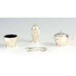 A MID 20TH CENTURY THREE-PIECE SILVER CRUET SET IN A FITTED BOX comprising of a pepper shaker,