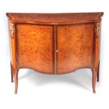 A FINE GEORGE III INLAID SERPENTINE SHAPED BURR ELM, HAREWOOD AND SATINWOOD COMMODE IN THE MANNER OF