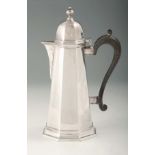 AN EDWARD VII SILVER COFFEE POT of tapering octagonal form with domed hinged lid and scrolled handle