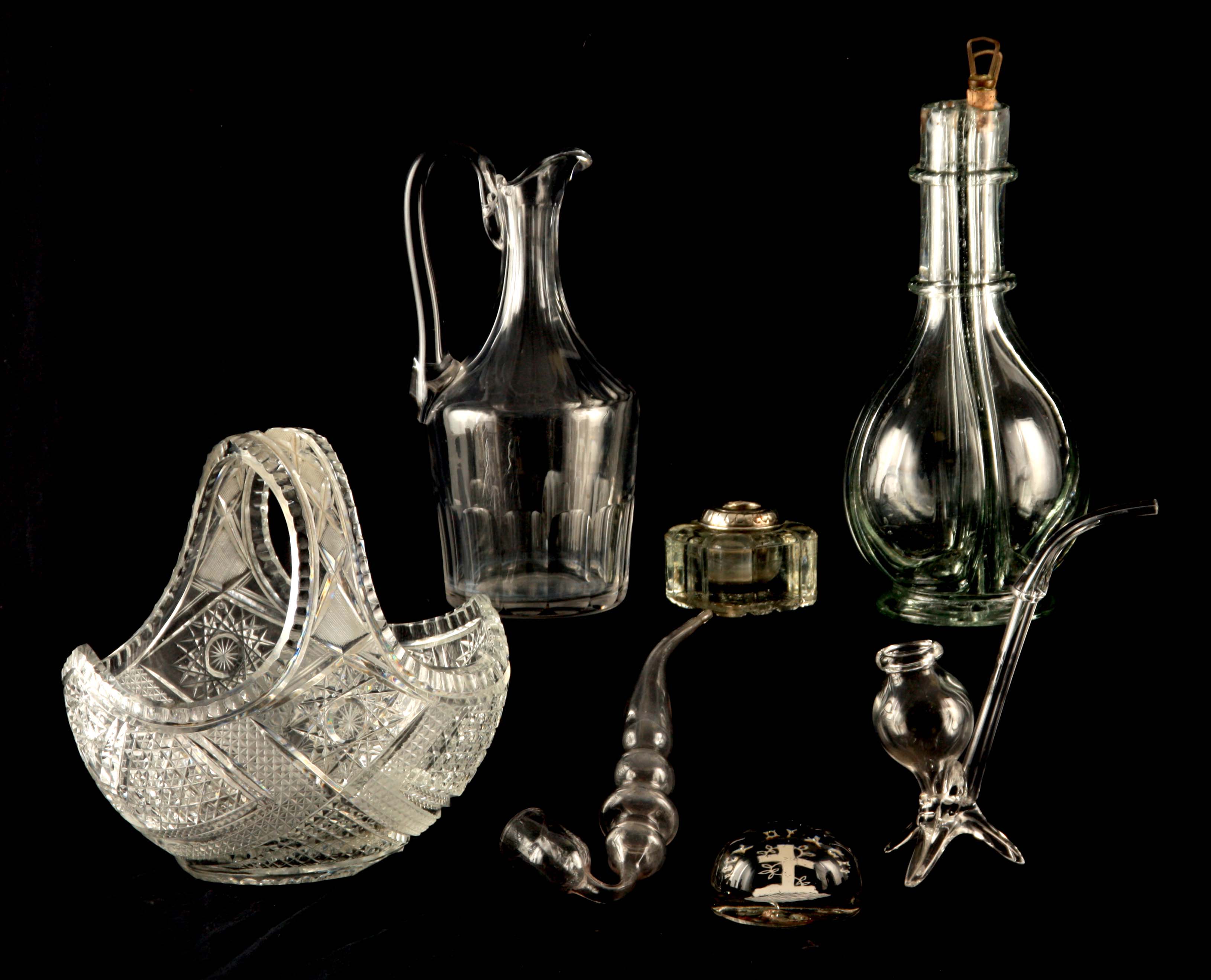 A 19TH CENTURY FAIT MAIN FRENCH FOUR CHAMBER LIQUOR DECANTER WITH CORKED STOPPERS of footed
