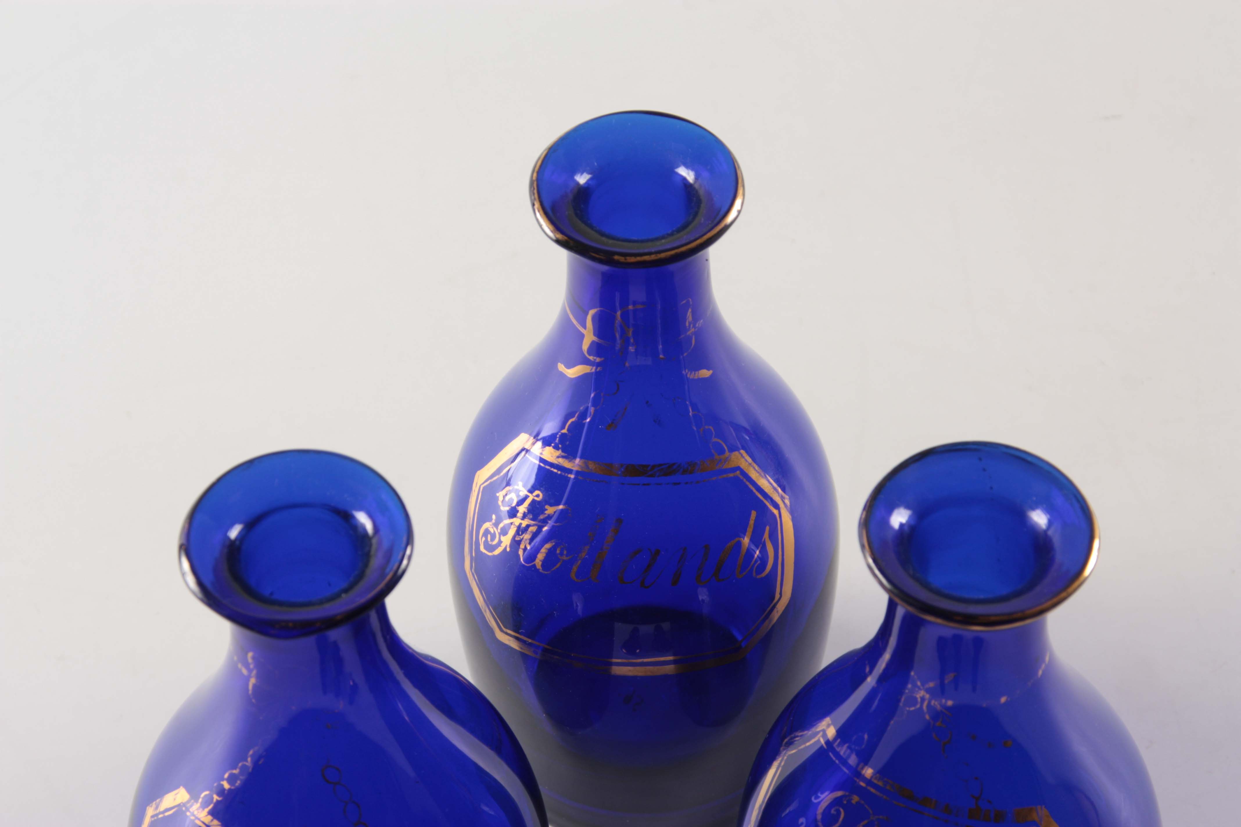 A SET OF THREE EARLY 19TH CENTURY BRISTOL BLUE GLASS DECANTERS for Rum, Brandy and Hollands with - Image 6 of 7