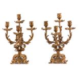 A PAIR OF 19TH CENTURY ORMOLU GILT BRASS FOUR BRANCH CANDELABRA of Rococo leaf work design 40cm