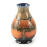 AN EARLY 20TH CENTURY MOORCROFT EVENTIDE LANDSCAPE VASE of baluster form, having a flared neck, 10cm