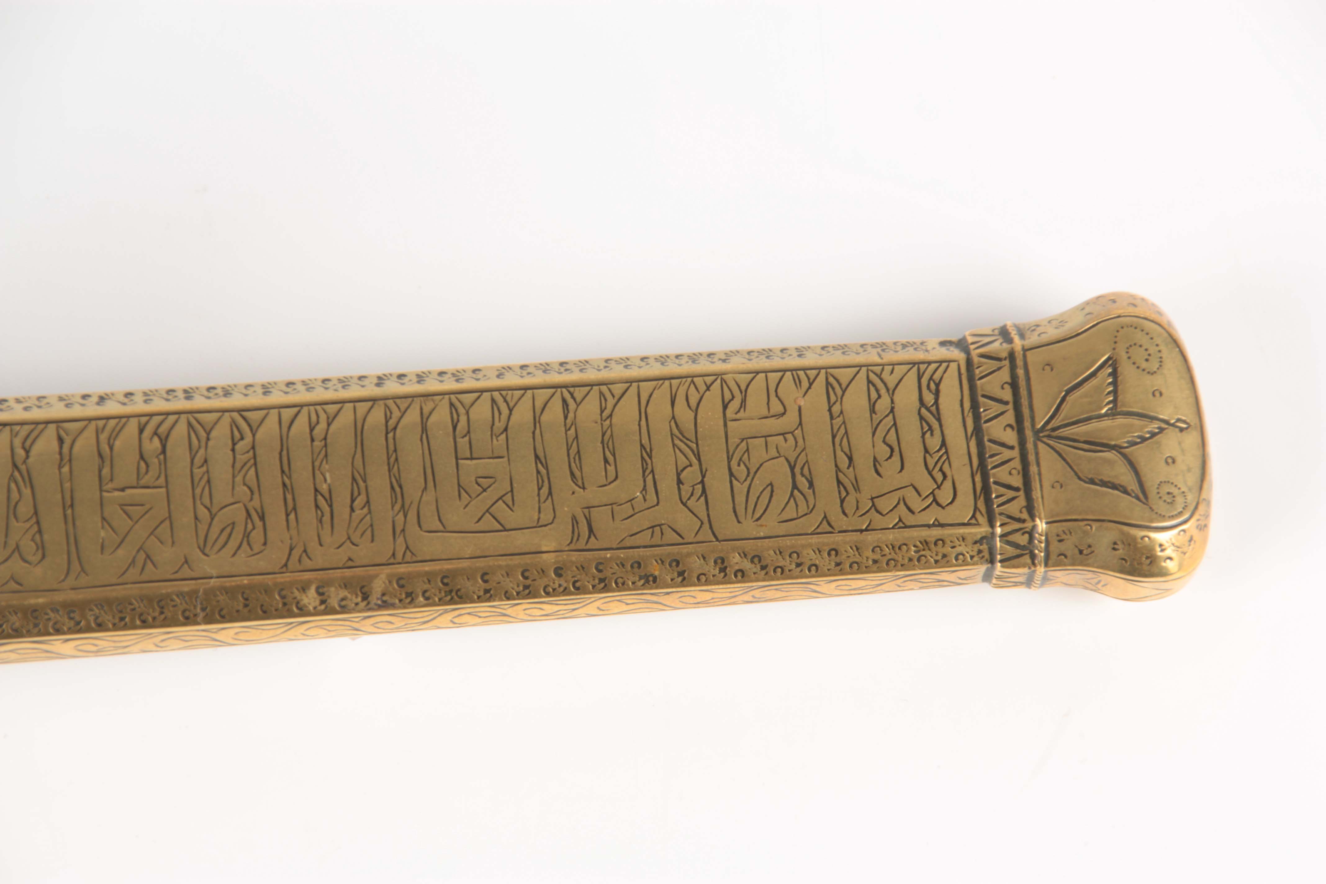 A 19TH CENTURY SIGNED MIDDLE EASTERN BRASS INKWELL QALAMDAN with Arabic calligraphy to the sides. - Image 3 of 4