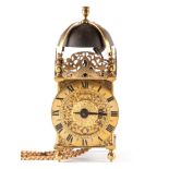 ROBERT QUELCH, OXFORD. A 17TH CENTURY LANTERN CLOCK surmounted by a large bell supported on a