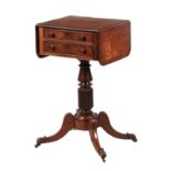AN EARLY 19TH CENTURY MAHOGANY SIDE TABLE with hinged sides and cross-banded top above two frieze