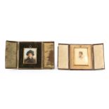 TWO EARLY 20TH CENTURY CASED PAINTED PORTRAIT MINIATURES ON IVORY both of rectangular form in gilt