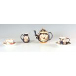 A FIRST PERIOD WORCESTER TYPE THREE PIECE SOLITAIRE SERVICE comprising a bulbous teapot with fruit