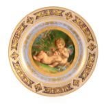 A LATE 19TH CENTURY ROYAL VIENNA CABINET PLATE with finely painted centre depicting Cupid and