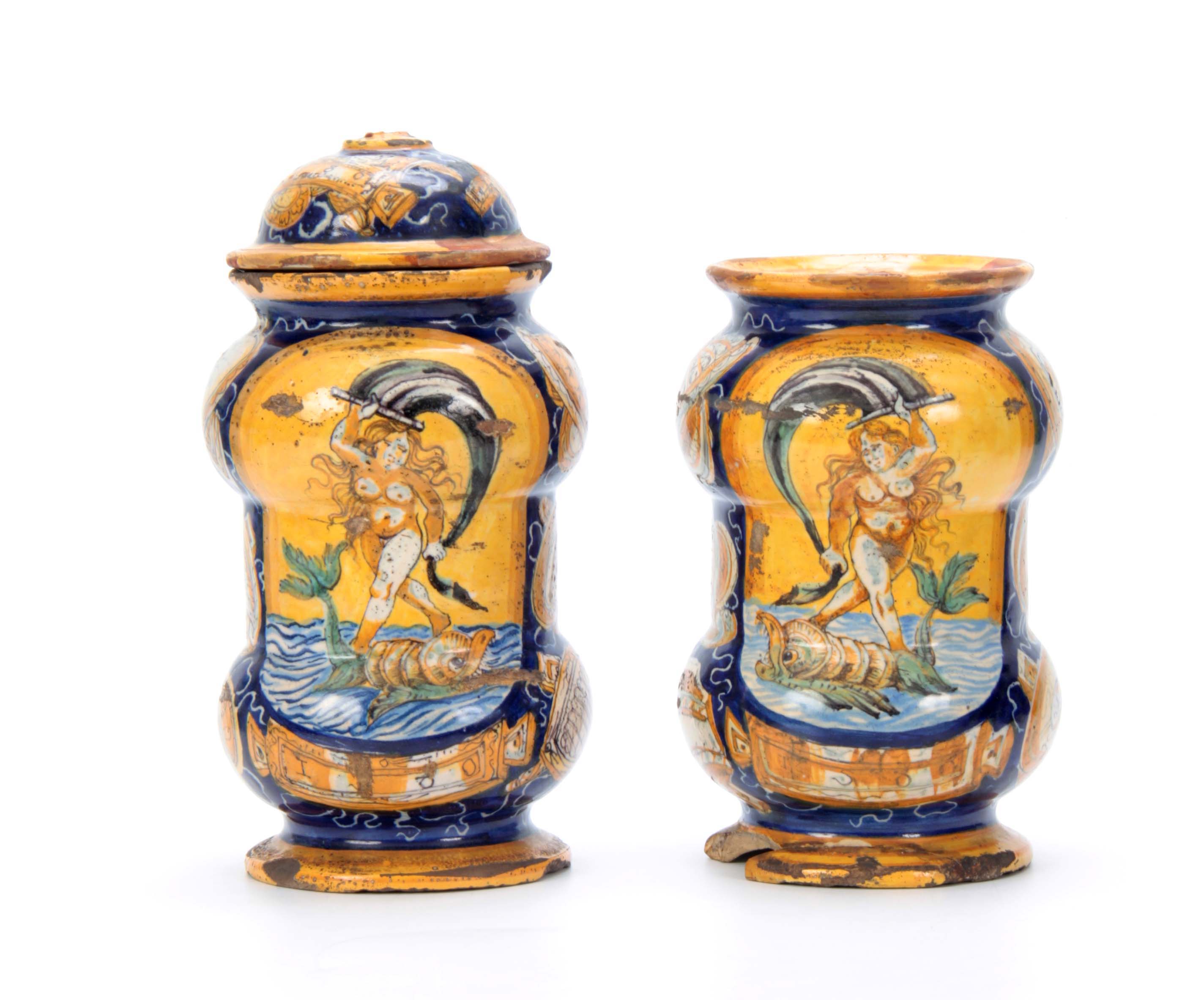 A PAIR OF CASTEL DURANTE MAIOLICA ALBARELLI DATED 1580 each painted with Venus riding a dolphin