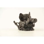 A LATE 19TH CENTURY PATINATED BRONZE INKSTAND modelled as a boars head with hinged mouth opening