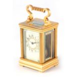 A LATE 19TH CENTURY FRENCH MINIATURE CARRIAGE CLOCK the gilt brass case with reeded corners