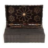 A MID 19TH CENTURY ANGLO-INDIAN COROMANDEL AND IVORY INLAID WRITING BOX of shaped outline with