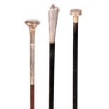 A SELECTION OF THREE EARLY 20TH CENTURY FRENCH SILVER TOPPED WALKING STICKS with ebony and