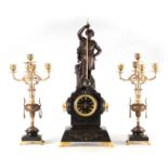 A LATE 19TH CENTURY FRENCH FIGURAL MYSTERY CLOCK GARNITURE the patinated bronzed metal figure