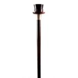 AN UNUSUAL 19TH CENTURY AMBER TOPPED WALKING STICK the handle formed as a Top Hat, having an