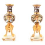 A FINE PAIR OF 19TH CENTURY FRENCH CHAMPLEVE ENAMEL AND ORMOLU MOUNTED VASES with panels of