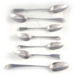 A COLLECTION OF SEVEN GEORGIAN AND MID VICTORIAN SILVER SERVING SPOONS AND TABLESPOONS largest