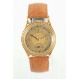 AN UNUSUAL GOLD 1930'S TOP WINDING OMEGA WRIST WATCH on brown leather strap with Omega buckle, the