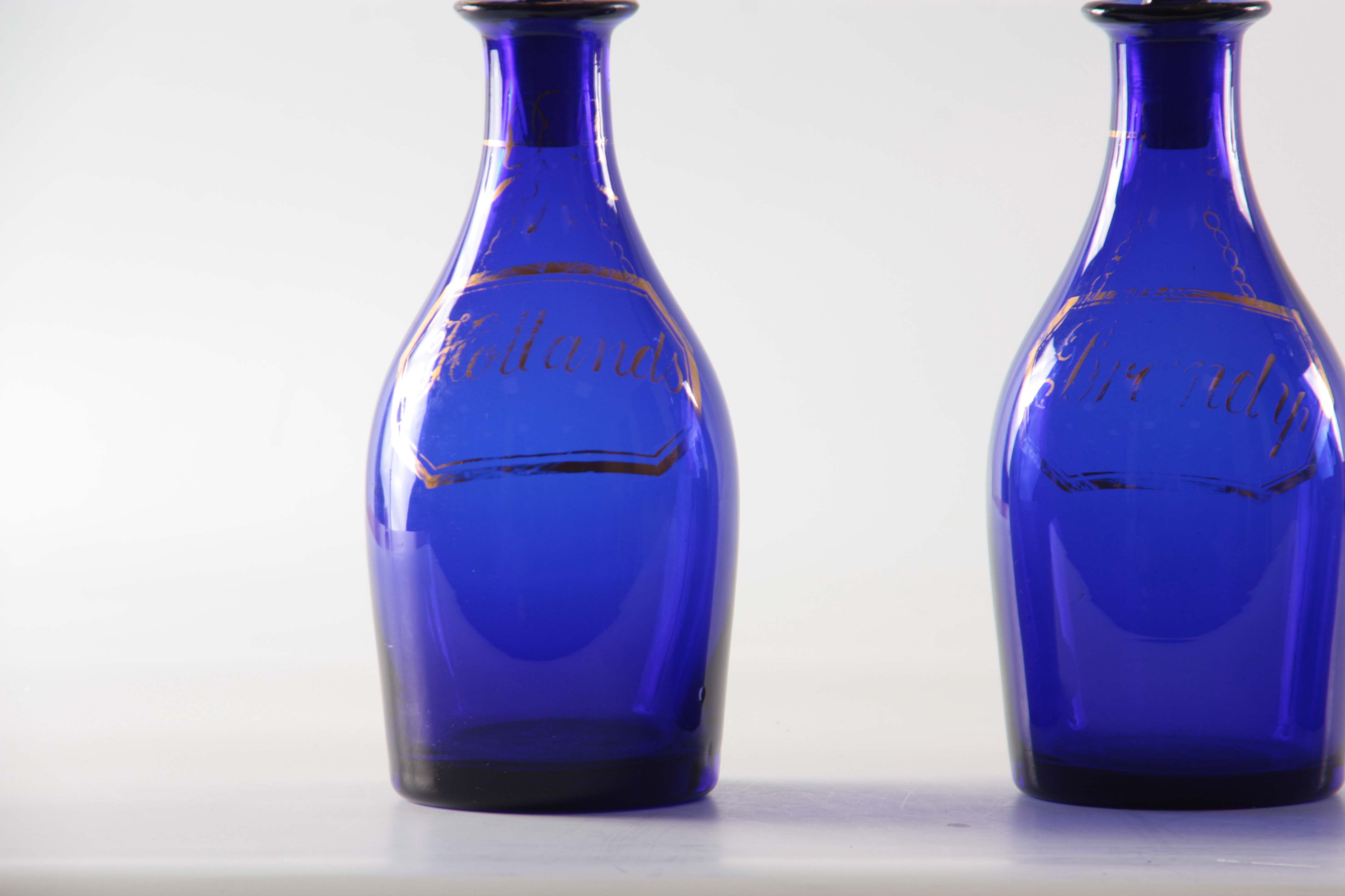 A SET OF THREE EARLY 19TH CENTURY BRISTOL BLUE GLASS DECANTERS for Rum, Brandy and Hollands with - Image 2 of 7