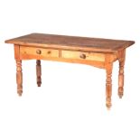 AN EARLY 19TH CENTURY REGENCY PINE KITCHEN TABLE with plank top above shallow frieze drawers