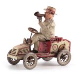 LEHMANN. AN EARLY 20TH CENTURY GERMAN 490 TUT TUT MOTOR CAR AND DRIVER the mechanical tin plate