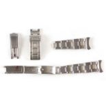 A VINTAGE STEEL ROLEX OYSTER BRACELET with expanding links and deployment clasp, together with a
