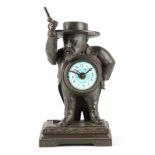 A LATE 19TH CENTURY FRENCH FIGURAL ALARM CLOCK modelled as Henri de Toulouse-Lautrec with moving arm