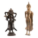 AN ORIENTAL BRONZE FIGURE OF A DEITY 24cm high together with A CAST IRON EXAMPLE 29.5cm high.