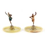JOSEF LORENZL. A PAIR OF SILVERED BRONZE AND ONYX ART DECO FIGURES modelled as dancing women mounted