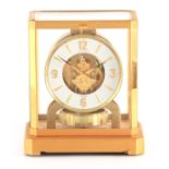 A JAEGER-LECOULTRE ATMOS CLOCK the gilt brass framed case with removable front glass panel enclosing