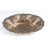 A VICTORIAN SILVER PIERCED BASKET with embossed floral decoration by George Nathan & Ridley Hayes,