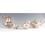 AN ELIZABETH II FOUR-PIECE SILVER TEA SERVICE of melon shape comprising teapot and coffee pot,