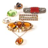 A COLLECTION OF SIX VINTAGE GOLD METAL AND SILVER GEM SET BROOCHES including an amber bee, (6)