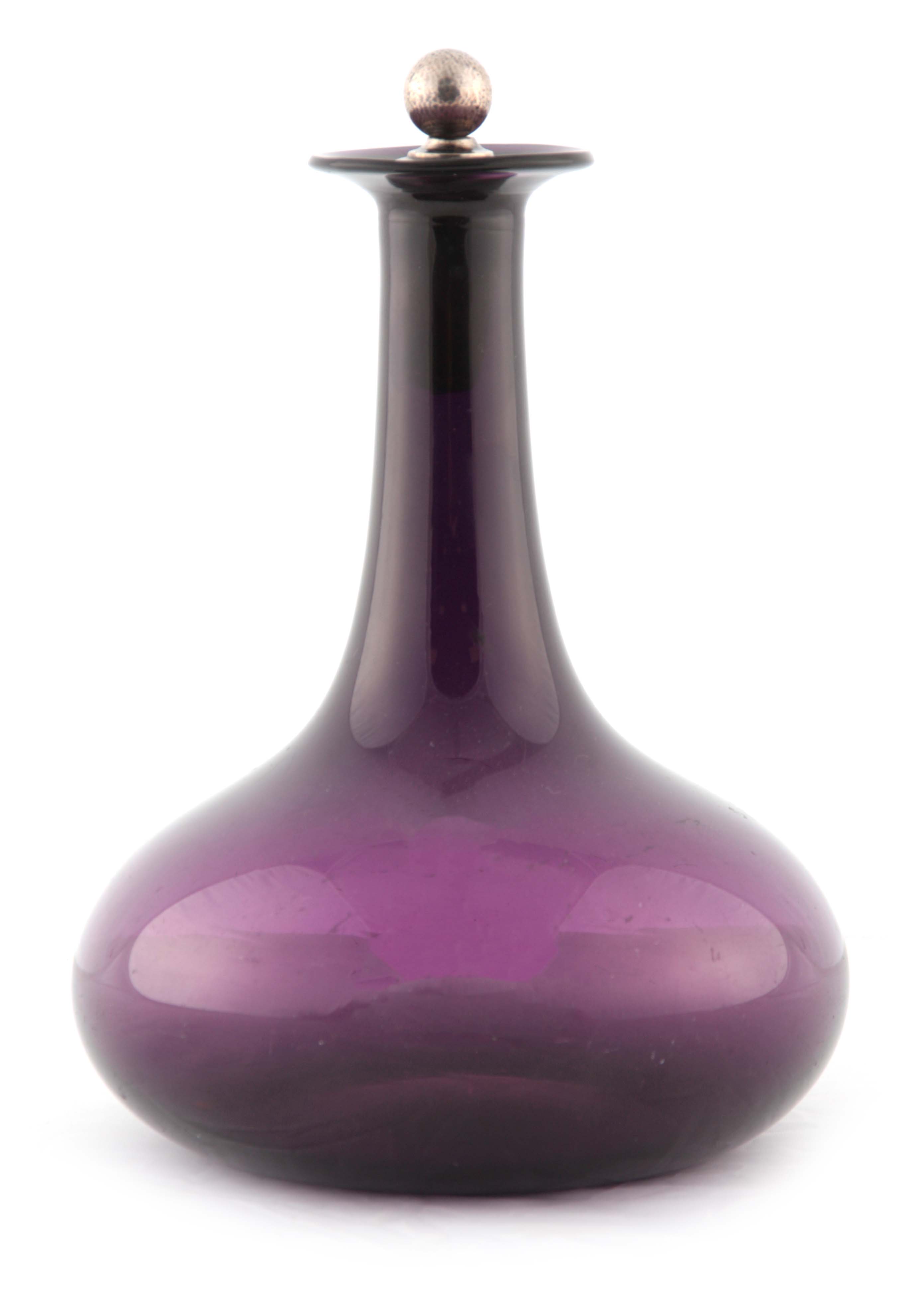 AN AMETHYST GLASS PORT DECANTER WITH SILVER METAL STOPPER of square form with silver metal mounted