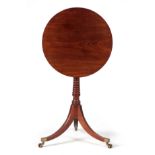 A LATE 18TH CENTURY FIGURED MAHOGANY TILT TOP OCCASIONAL TABLE with a reeded moulded edge; on a