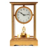 AN EARLY 20TH CENTURY FOUR-GLASS 400 DAY TORSION CLOCK the gilt case with moulded top and reeded